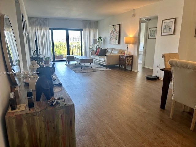 575 Crandon Blvd Unit 707, Key Biscayne, FL 33149 - living room with baseboards and wood finished floors