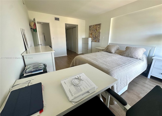 575 Crandon Blvd Unit 707, Key Biscayne, FL 33149 - bedroom with baseboards, dark wood-style flooring, and visible vents