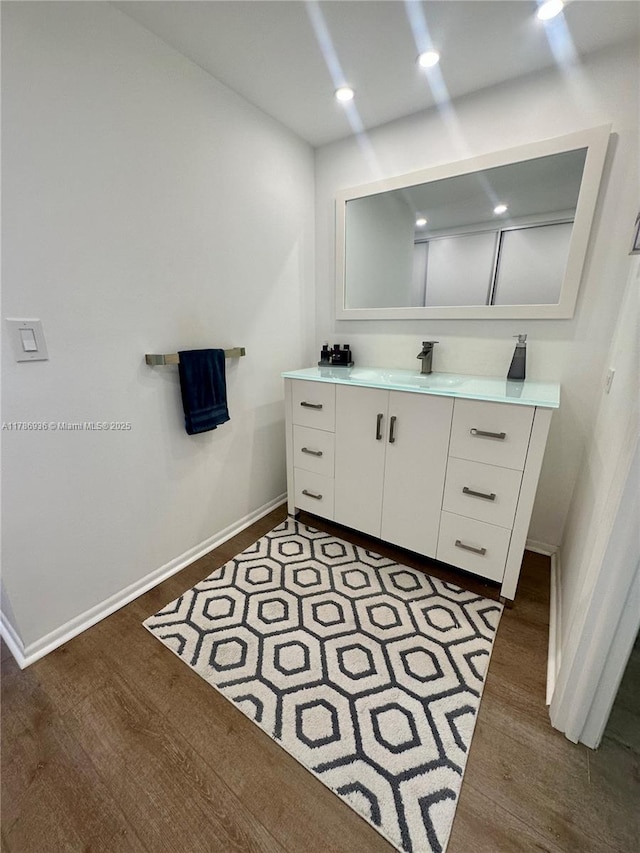 575 Crandon Blvd Unit 707, Key Biscayne, FL 33149 - bathroom with baseboards, wood finished floors, and vanity