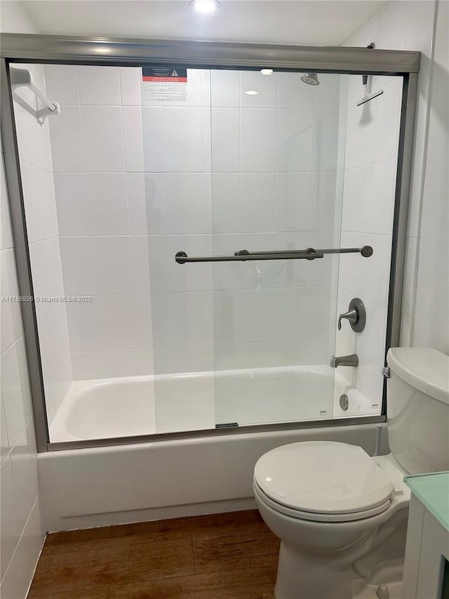 575 Crandon Blvd Unit 707, Key Biscayne, FL 33149 - full bathroom featuring wood finished floors, enclosed tub / shower combo, and toilet