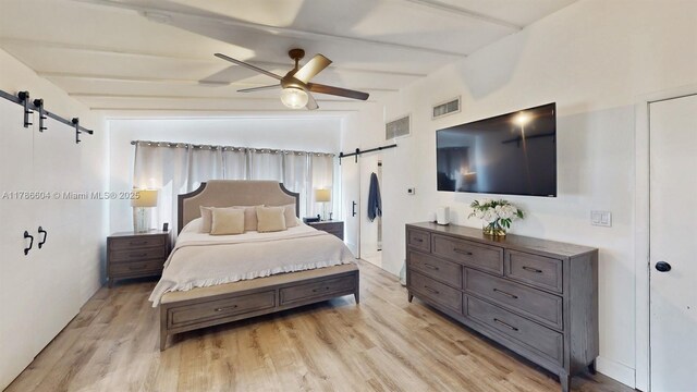 9925 SW 82nd Ave, Miami, FL 33156 - bedroom featuring a barn door, beamed ceiling, light wood-type flooring, and ceiling fan
