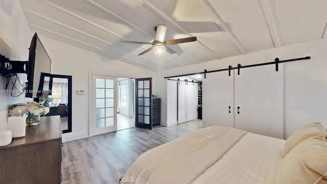 9925 SW 82nd Ave, Miami, FL 33156 - bedroom featuring a barn door, wood finished floors, and ceiling fan