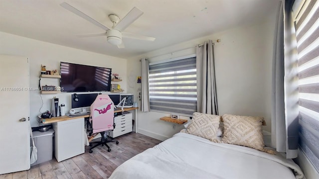 9925 SW 82nd Ave, Miami, FL 33156 - bedroom with a desk, light wood-style flooring, and ceiling fan