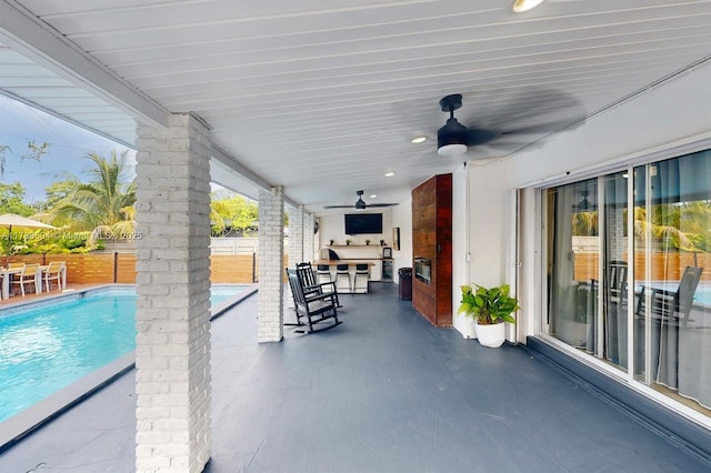 9925 SW 82nd Ave, Miami, FL 33156 - fenced backyard with a patio, a ceiling fan, and an outdoor pool