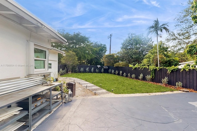9925 SW 82nd Ave, Miami, FL 33156 - fenced backyard with a patio