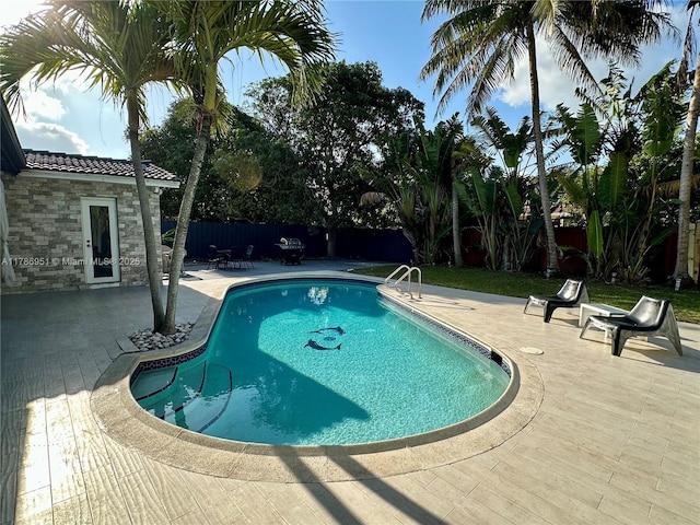 5424 Garfield St, Hollywood, FL 33021 - view of pool featuring a patio, a fenced in pool, and a fenced backyard
