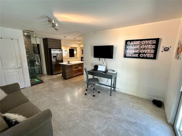 5424 Garfield St, Hollywood, FL 33021 - living area featuring baseboards