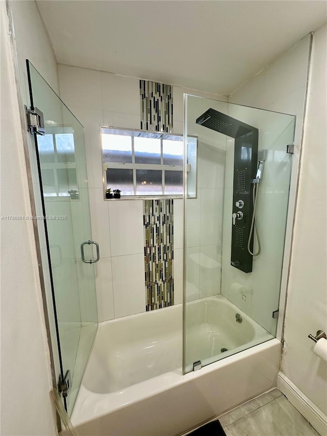 5424 Garfield St, Hollywood, FL 33021 - full bath featuring bath / shower combo with glass door and baseboards