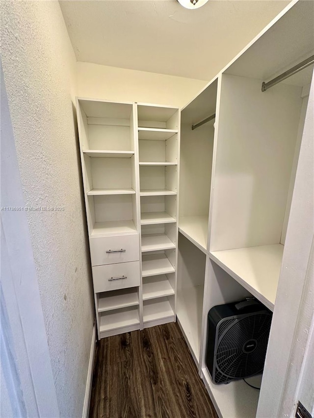 5424 Garfield St, Hollywood, FL 33021 - spacious closet featuring dark wood-style floors