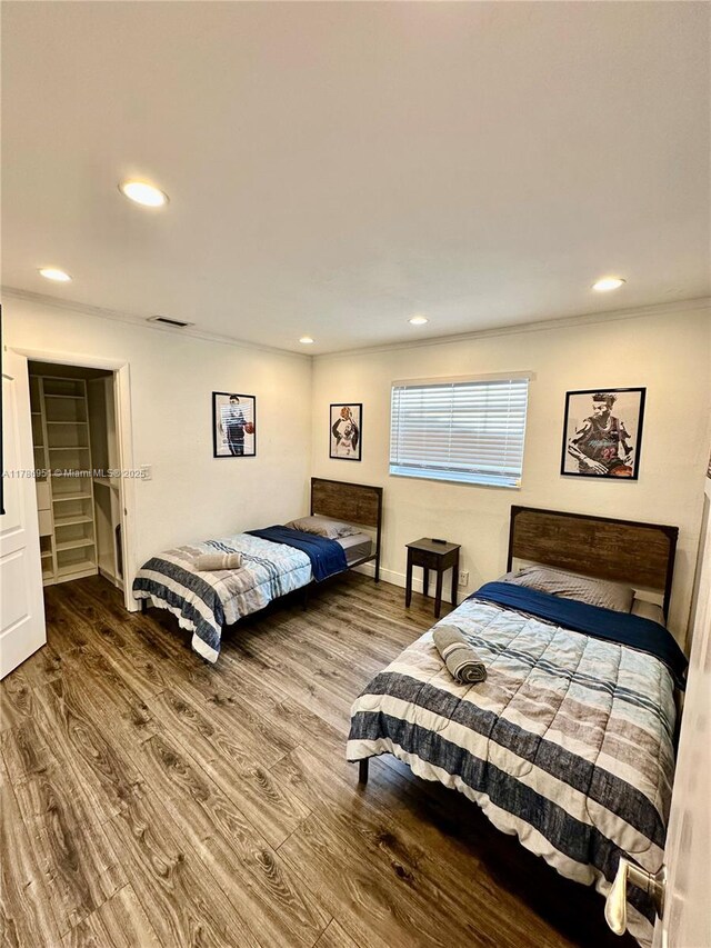 5424 Garfield St, Hollywood, FL 33021 - bedroom featuring wood finished floors, recessed lighting, ornamental molding, and baseboards