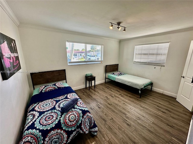 5424 Garfield St, Hollywood, FL 33021 - bedroom featuring wood finished floors, crown molding, and baseboards