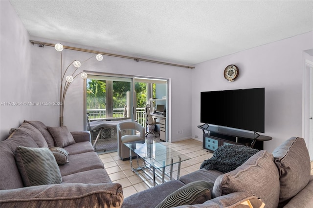 3800 Hillcrest Dr Unit 210, Hollywood, FL 33021 - living area with light tile patterned floors and a textured ceiling
