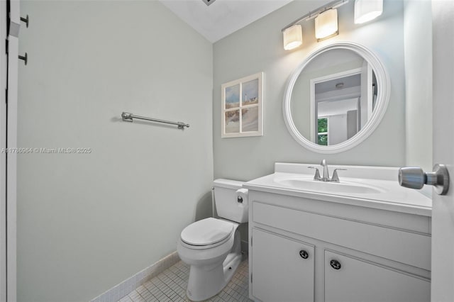 3800 Hillcrest Dr Unit 210, Hollywood, FL 33021 - bathroom with toilet, vanity, baseboards, and tile patterned flooring