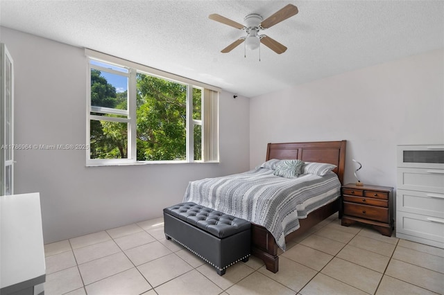 3800 Hillcrest Dr Unit 210, Hollywood, FL 33021 - bedroom with a textured ceiling, light tile patterned flooring, and ceiling fan
