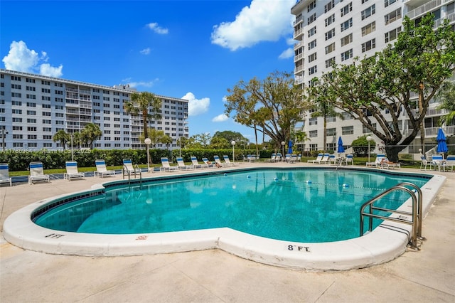 3800 Hillcrest Dr Unit 210, Hollywood, FL 33021 - community pool with a patio area