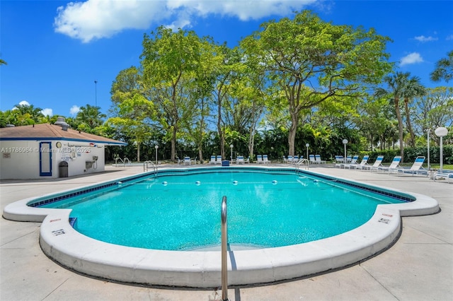 3800 Hillcrest Dr Unit 210, Hollywood, FL 33021 - community pool featuring a patio