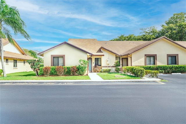 single story home with stucco siding