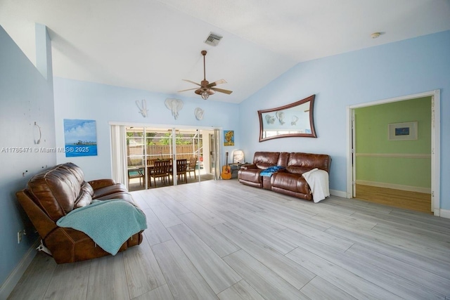 710 Daffodil Dr, Wellington, FL 33414 - living area featuring ceiling fan, visible vents, vaulted ceiling, baseboards, and wood finished floors