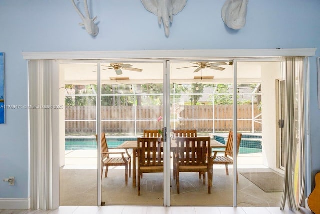 710 Daffodil Dr, Wellington, FL 33414 - dining area with a wealth of natural light, tile patterned floors, and a ceiling fan
