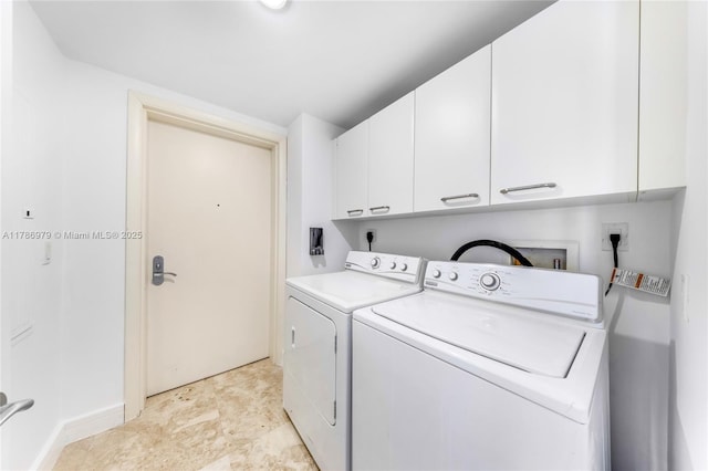 17001 Collins Ave Unit 2401, Sunny Isles Beach, FL 33160 - laundry room with cabinet space, baseboards, and washer and clothes dryer