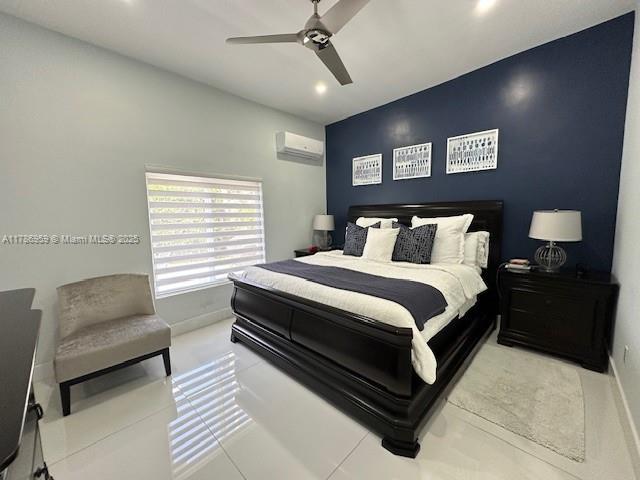 bedroom featuring baseboards, an AC wall unit, recessed lighting, and ceiling fan