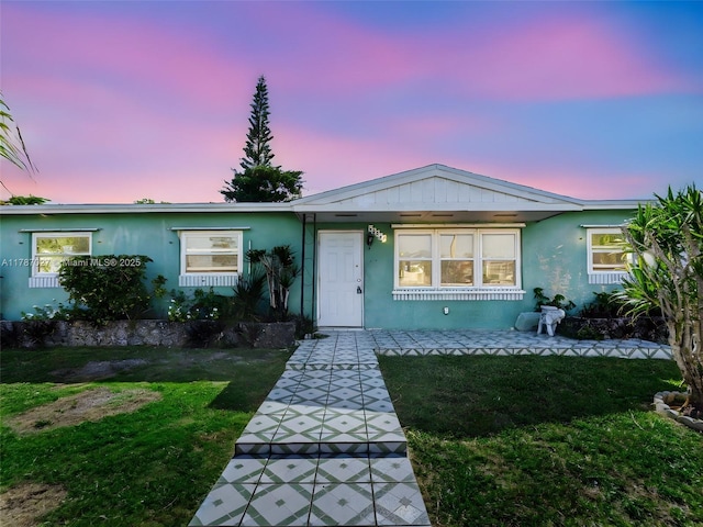 22534 SW 114th Pl, Miami, FL 33170 - view of front of house with a front yard and stucco siding