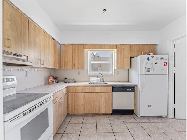 22534 SW 114th Pl, Miami, FL 33170 - kitchen with white appliances, under cabinet range hood, light countertops, light tile patterned flooring, and light brown cabinets