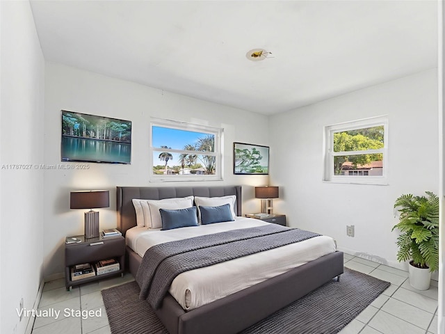 22534 SW 114th Pl, Miami, FL 33170 - bedroom with light tile patterned floors and baseboards