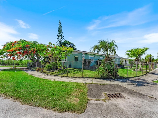 22534 SW 114th Pl, Miami, FL 33170 - view of front of house featuring a fenced front yard and stucco siding