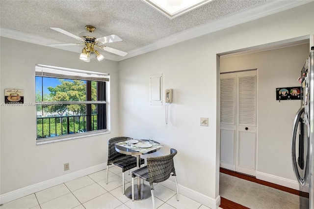 370 NW 76th Ave Unit 307, Margate, FL 33063 - dining area featuring a ceiling fan, a textured ceiling, and crown molding