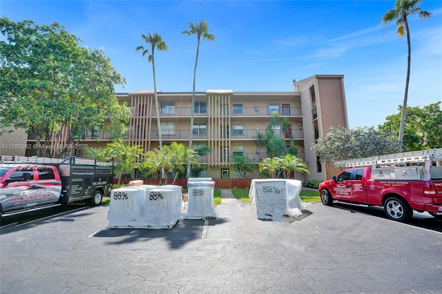 370 NW 76th Ave Unit 307, Margate, FL 33063 - view of apartment building / complex featuring uncovered parking