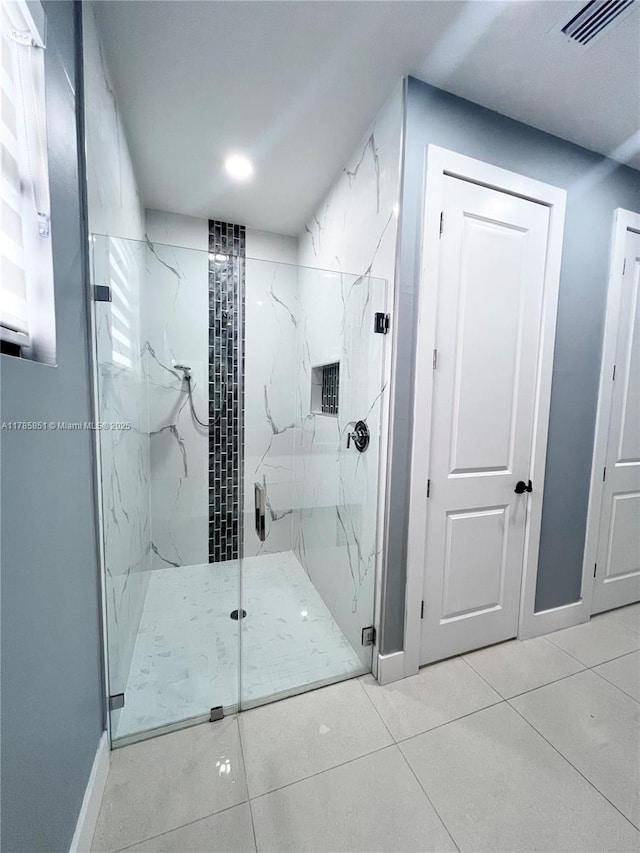 314 Chiquita Blvd N, Cape Coral, FL 33993 - full bath with baseboards, a marble finish shower, and tile patterned flooring