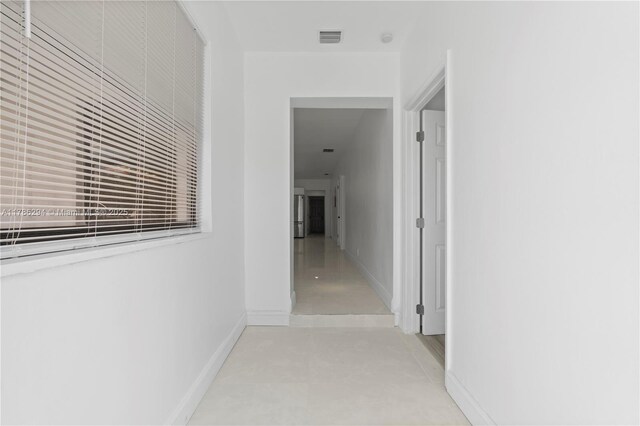 720 NW 6th St, Hallandale Beach, FL 33009 - corridor with baseboards