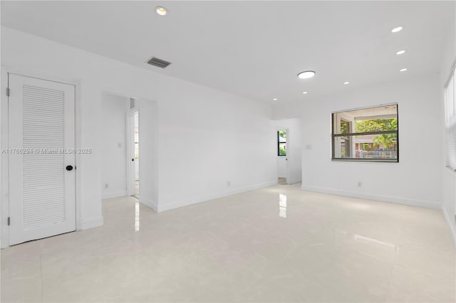 720 NW 6th St, Hallandale Beach, FL 33009 - empty room featuring recessed lighting and baseboards