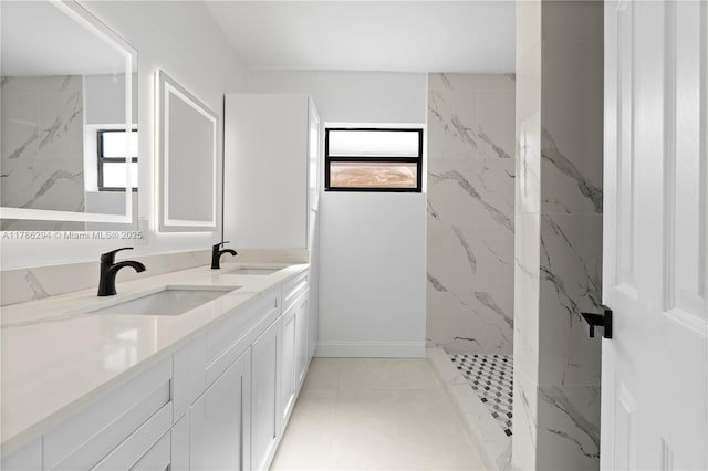 720 NW 6th St, Hallandale Beach, FL 33009 - bathroom with double vanity and a marble finish shower