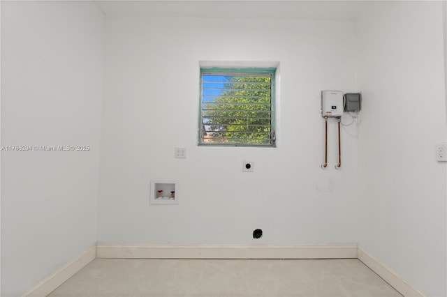 720 NW 6th St, Hallandale Beach, FL 33009 - laundry room featuring washer hookup, baseboards, and hookup for an electric dryer
