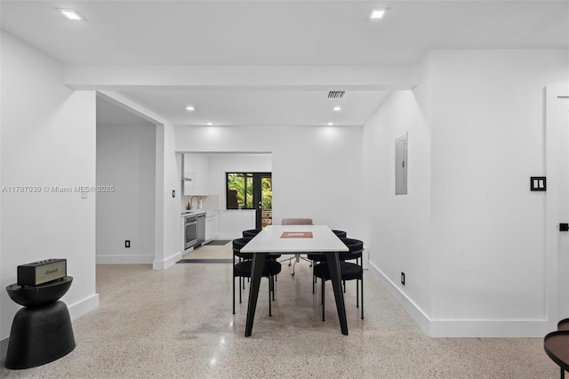 dining room featuring electric panel, light speckled floor, baseboards, visible vents, and recessed lighting