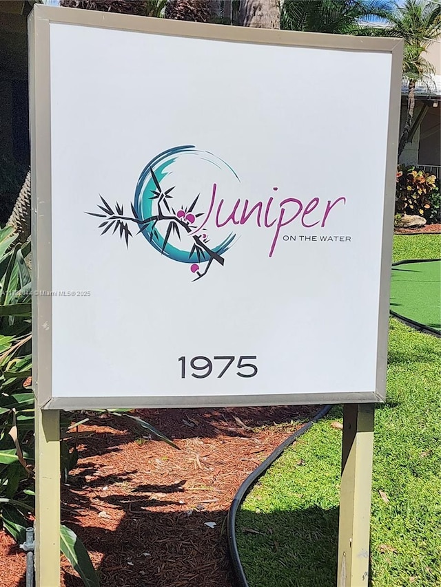 view of community sign