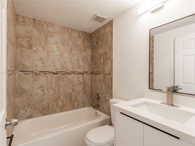 bathroom featuring a textured ceiling, vanity, toilet, shower / bathtub combination, and visible vents