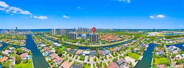bird's eye view with a city view and a water view