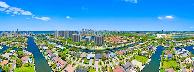 bird's eye view with a view of city and a water view