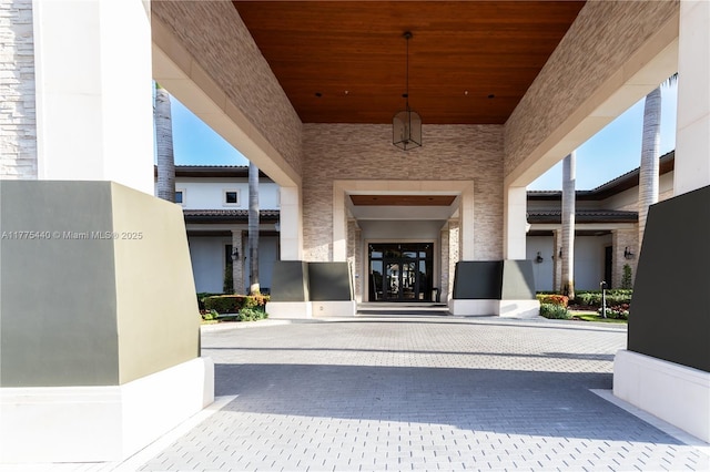 doorway to property with stucco siding
