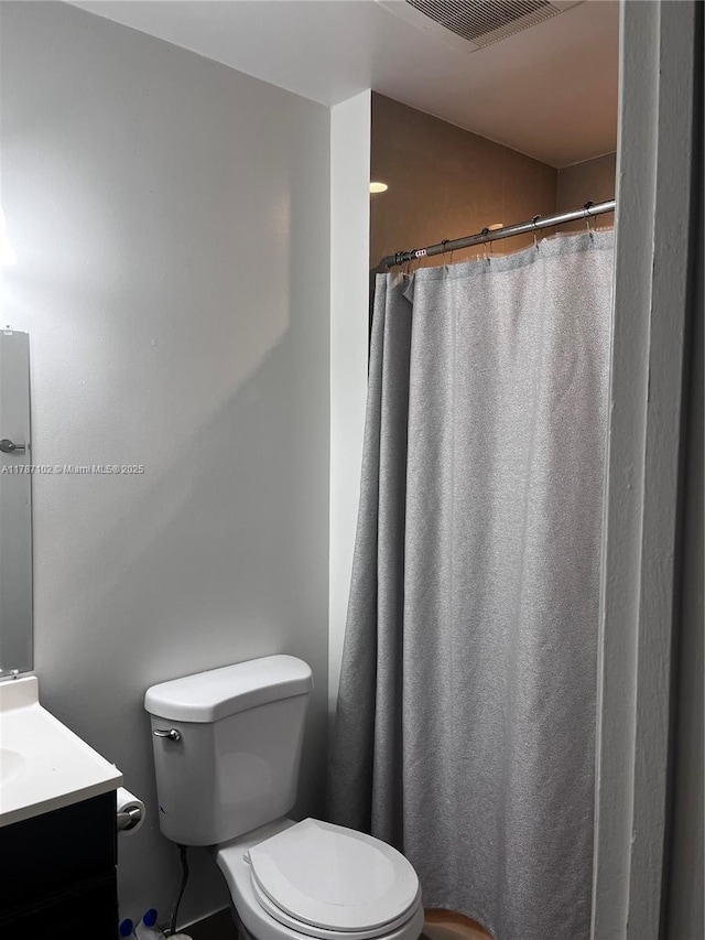 4335 NW 4th Ave, Deerfield Beach, FL 33064 - bathroom with toilet, vanity, and a shower with curtain