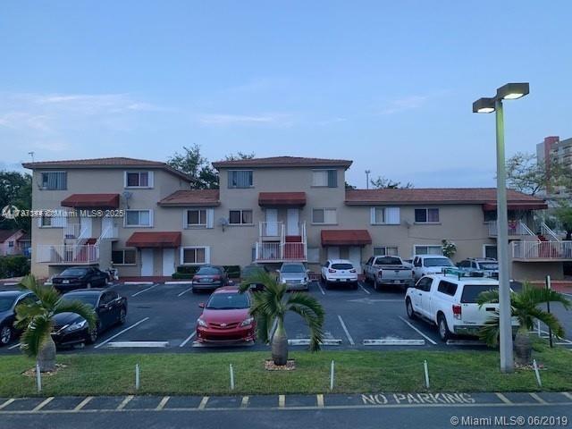 1618 NW 38th St Unit B4, Miami, FL 33142 - view of property with uncovered parking