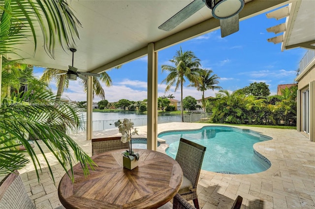 5337 SW 131st Ter, Miramar, FL 33027 - view of pool with a patio, a water view, a fenced backyard, and a pool with connected hot tub