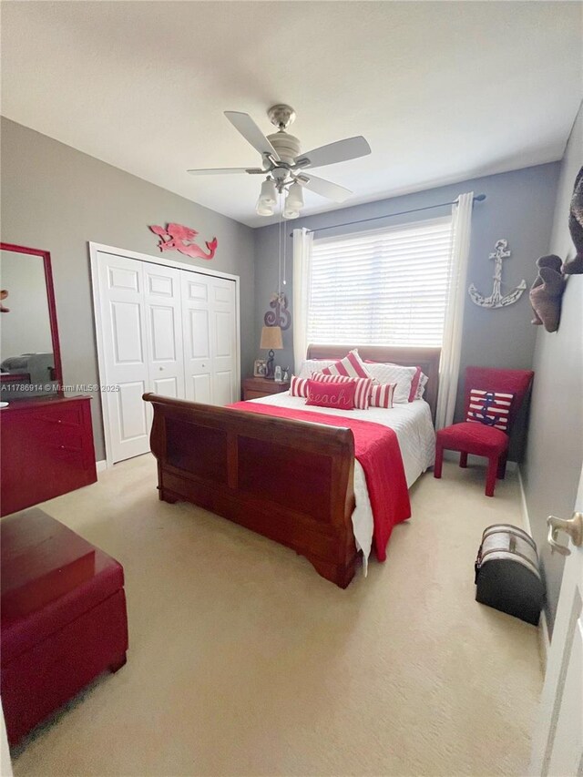5337 SW 131st Ter, Miramar, FL 33027 - bedroom with carpet flooring, a closet, and a ceiling fan