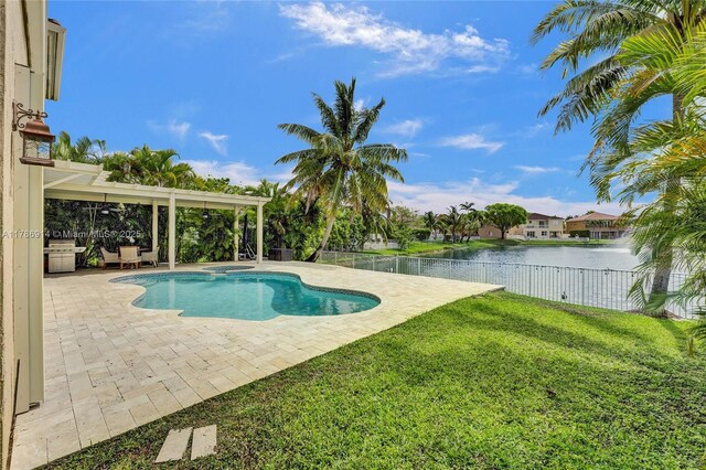 5337 SW 131st Ter, Miramar, FL 33027 - view of swimming pool featuring a patio and a pool with connected hot tub