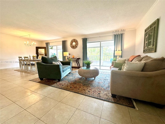 1001 Hillcrest Ct Unit 306, Hollywood, FL 33021 - tiled living room featuring a textured ceiling, a chandelier, and a healthy amount of sunlight