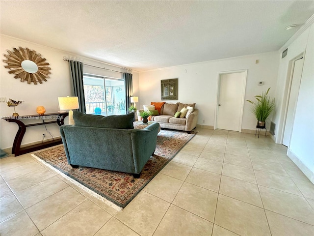 1001 Hillcrest Ct Unit 306, Hollywood, FL 33021 - living room featuring a textured ceiling and light tile patterned floors