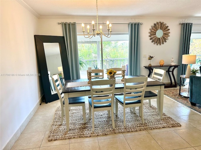 1001 Hillcrest Ct Unit 306, Hollywood, FL 33021 - dining space featuring baseboards, tile patterned flooring, a notable chandelier, and crown molding
